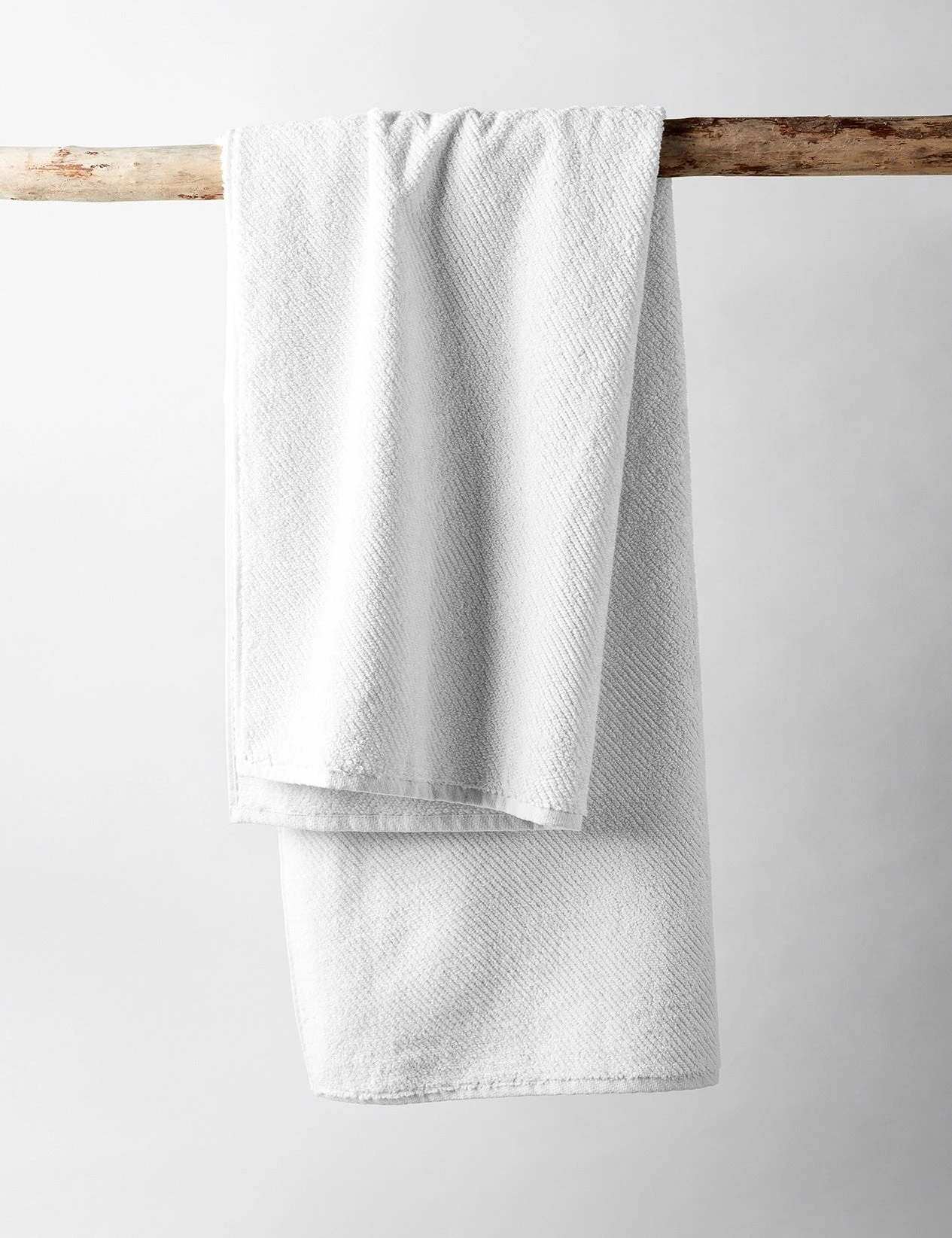 air_weight_alpine_white_hanging.jpg Lulu And Georgia Earth Tones Coyuchi Air Weight Towel Set